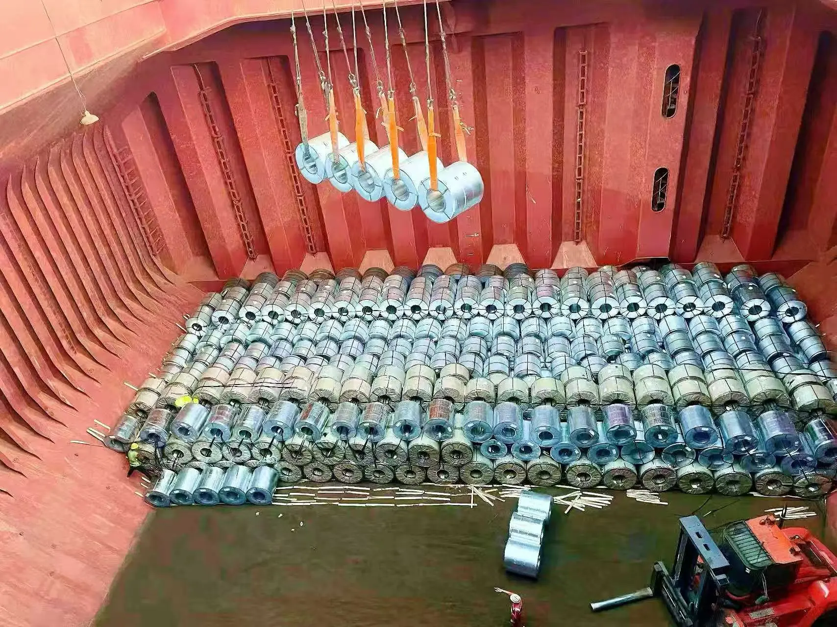 Galvanized steel coils in factory warehouse