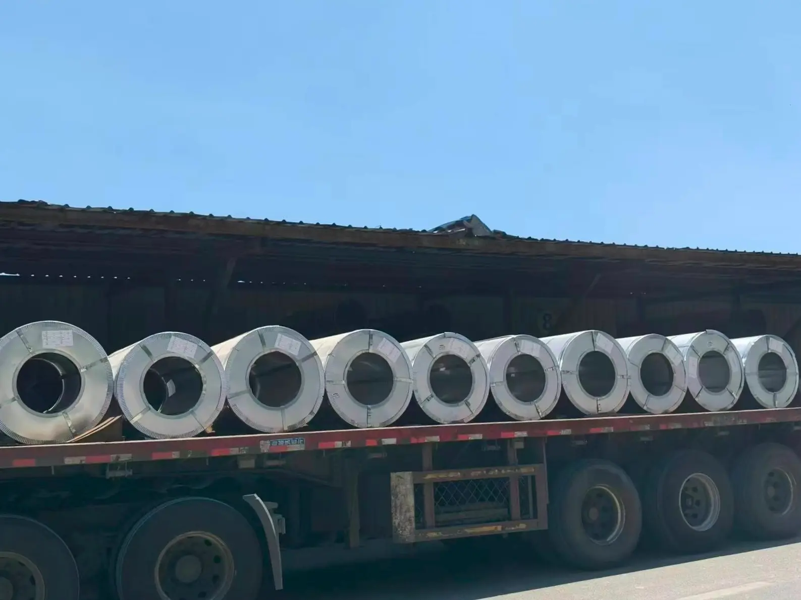 Galvanized steel coils stored in factory warehouse
